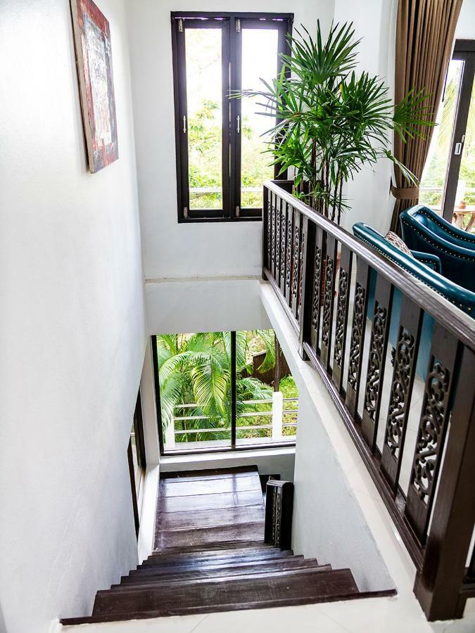 Joy'S Homestay Тау Экстерьер фото